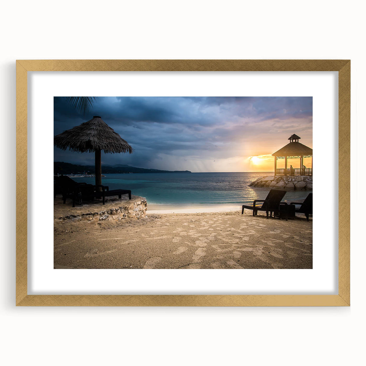 Abstract art print featuring a Caribbean scenery in vibrant blue and green tones, framed in gold.