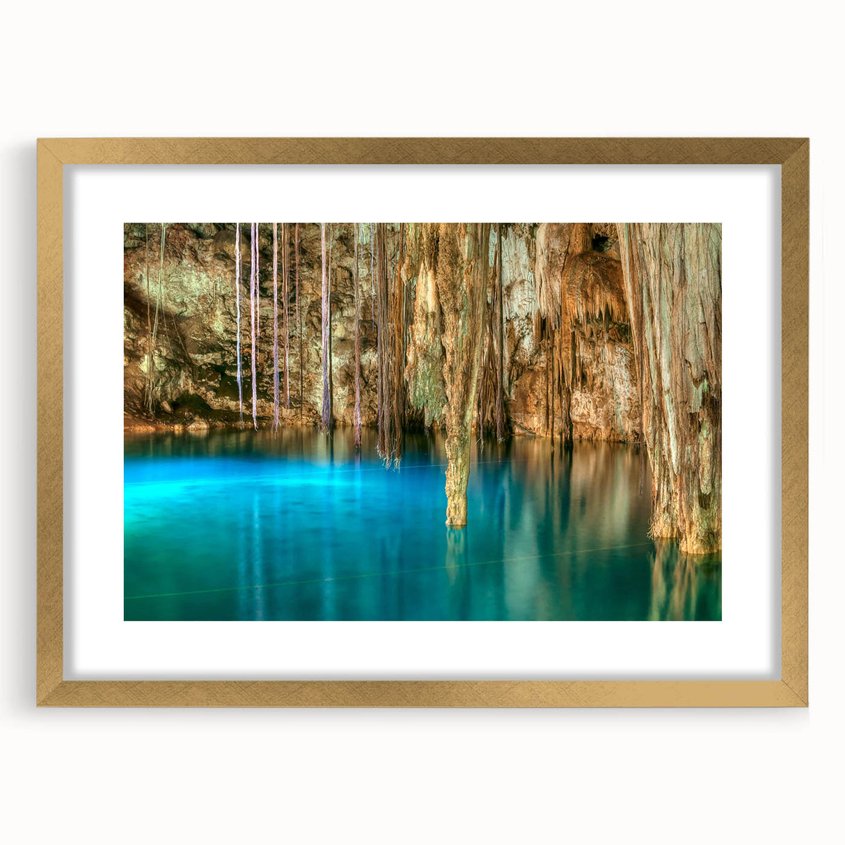Extra large abstract art print depicting textured scenery of Yucatán, with muted earth tones, framed in gold.