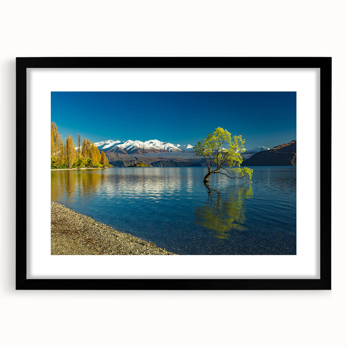 Extra large abstract art print of a colorful, textured New Zealand Otago landscape on a black framed canvas.