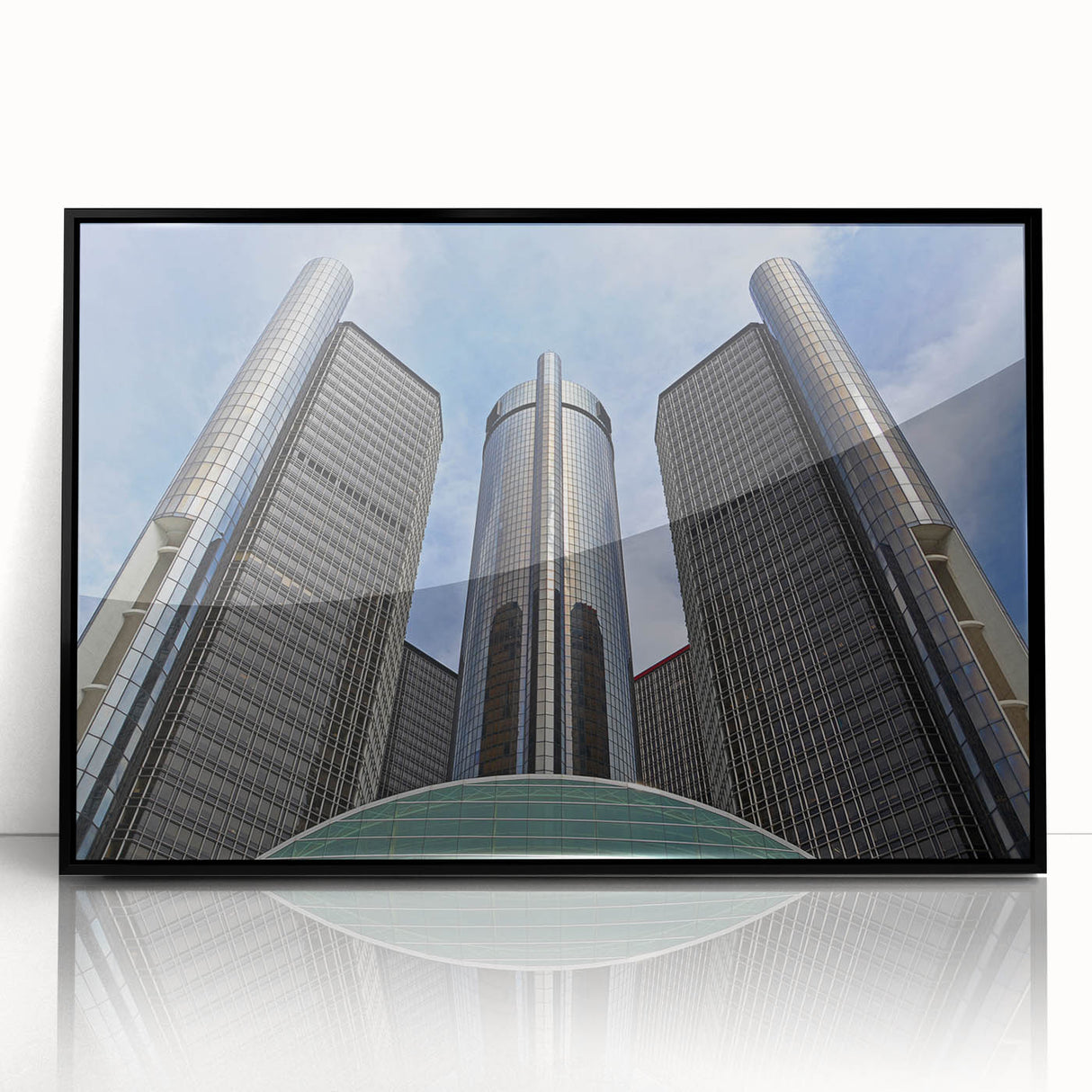Large abstract wall art depicting Detroit skyline in muted gray and blue tones, framed in black acrylic.