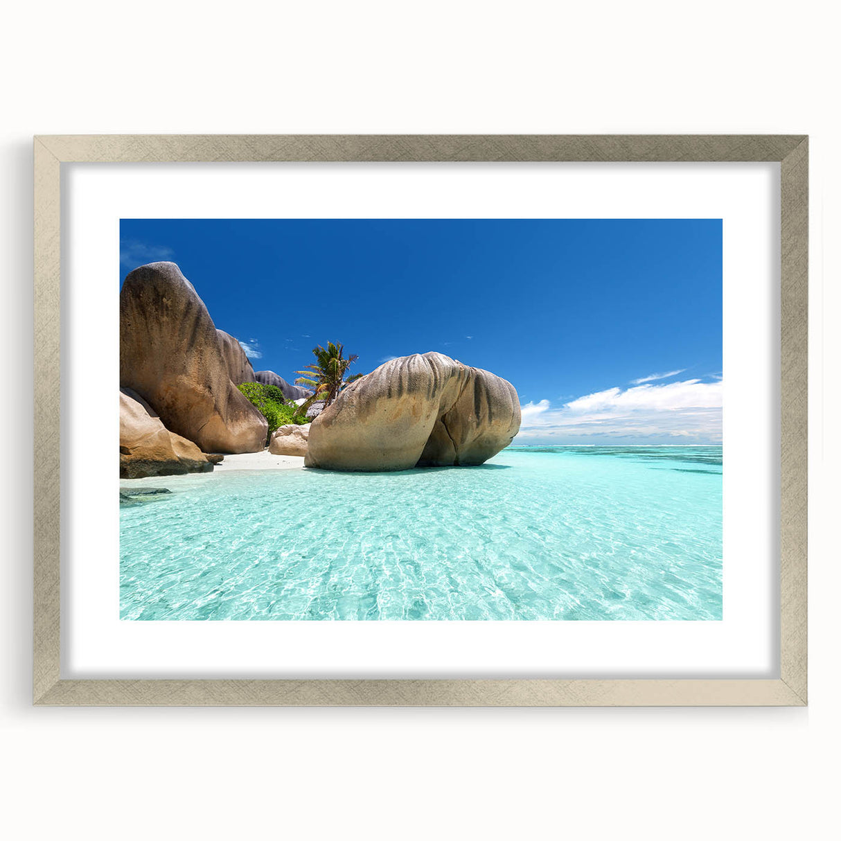 Extra large abstract art print of Seychelles scenery in silver frame, featuring textured blue and green tones.