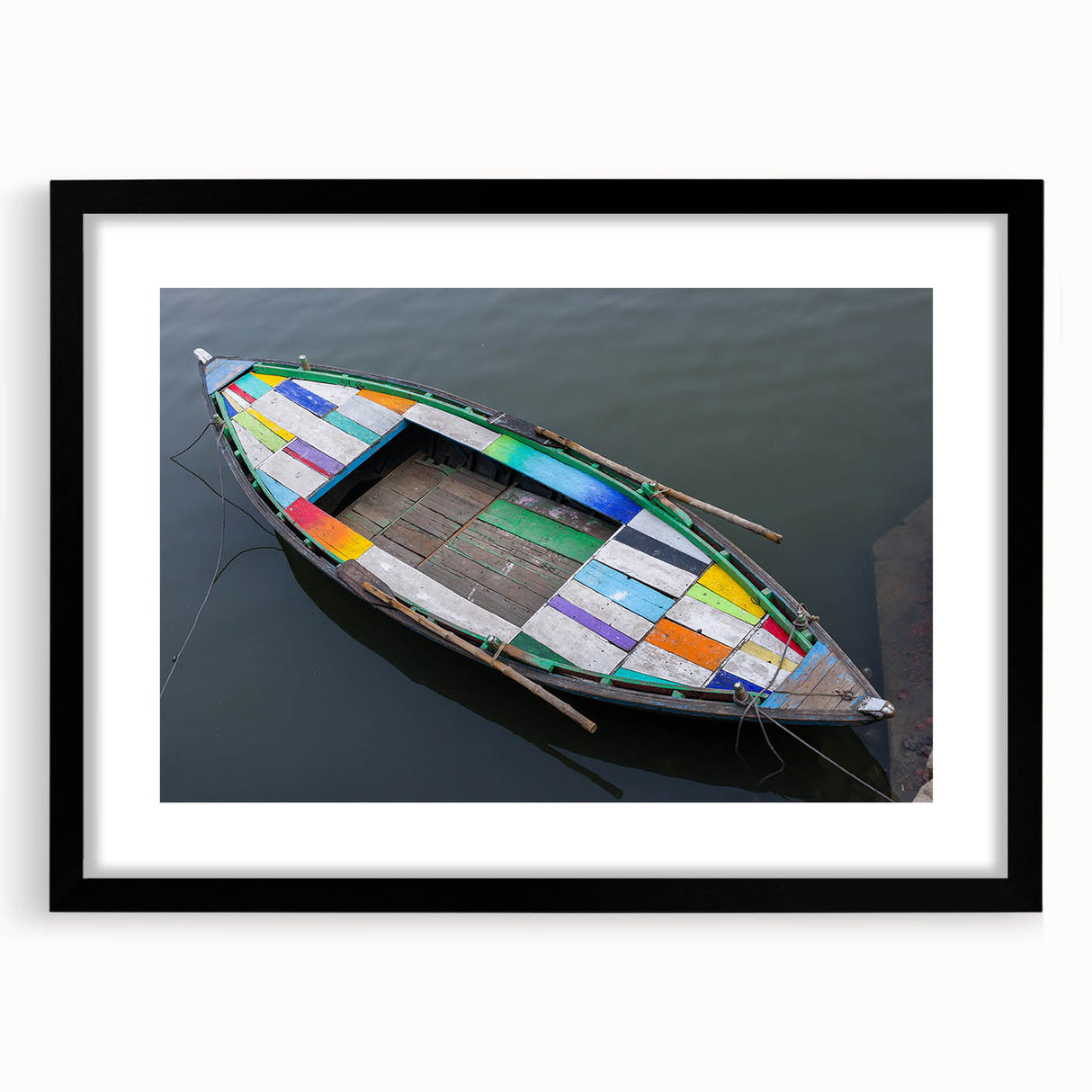 Extra large, colorful abstract art print of a textured Indian scenery on a black framed canvas, ideal for living room decor.