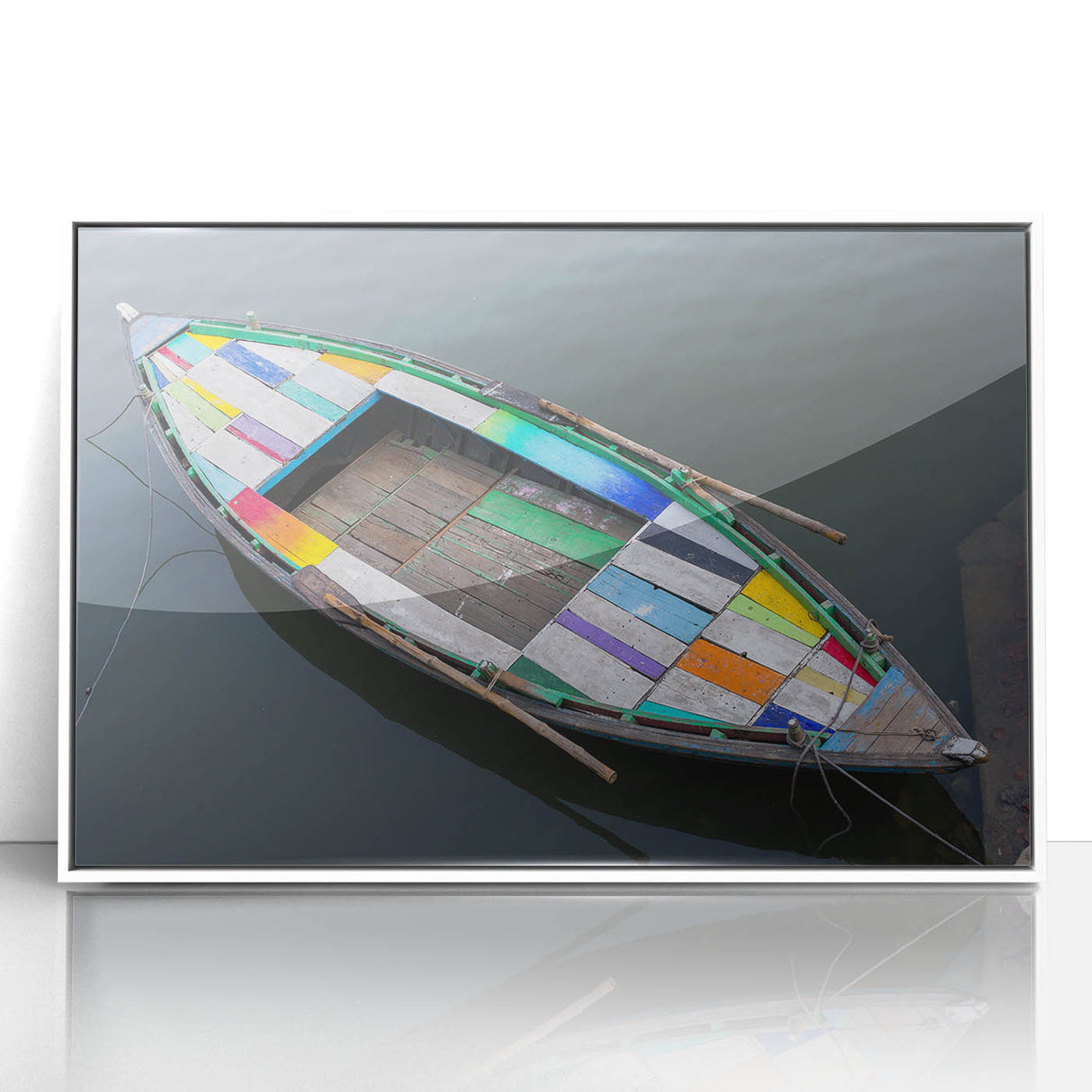 Art deco poster of an Indian scenery in muted earth tones on a white acrylic framed print.