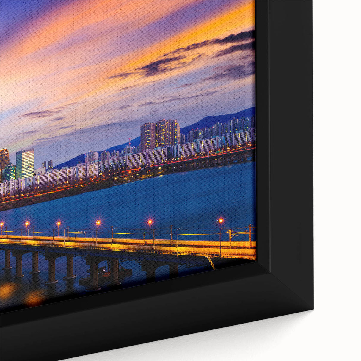 Extra large black wall art depicting Seoul's skyline in vibrant colors on a textured framed canvas.