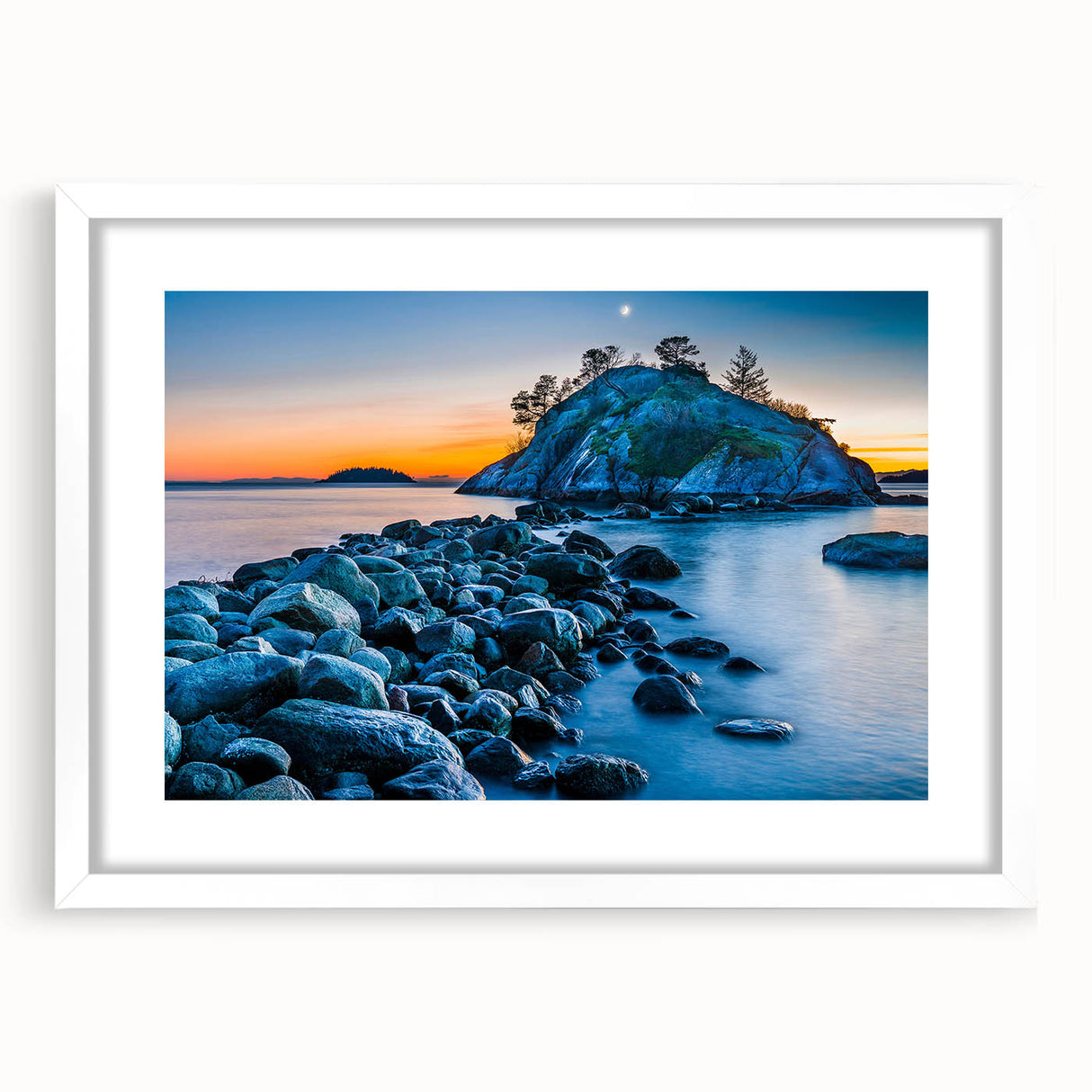 Abstract art print of British Columbia scenery in muted green and blue tones, framed with a white mat.