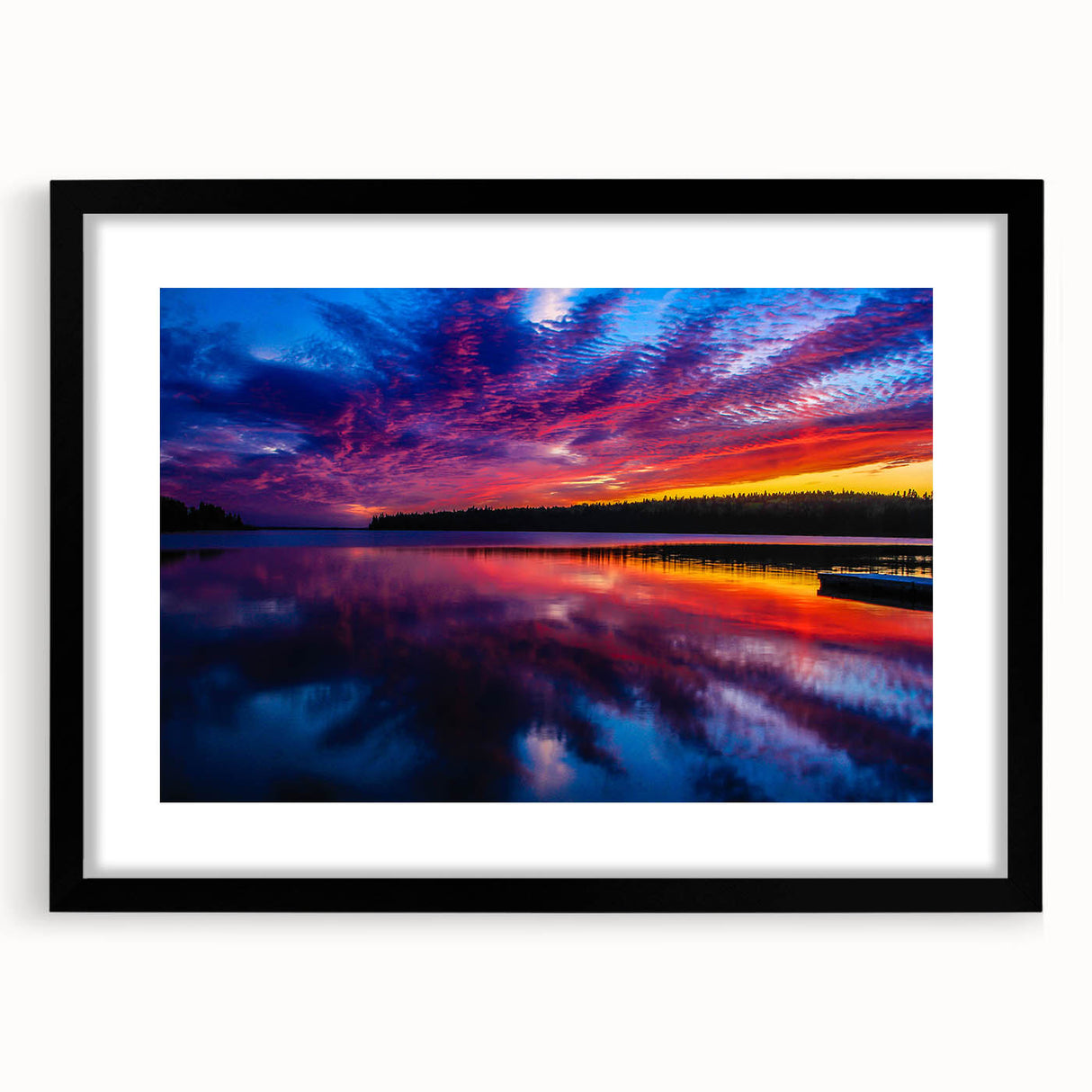 Abstract art print featuring vibrant, textured colors of a Manitoba scenery on a large framed canvas.