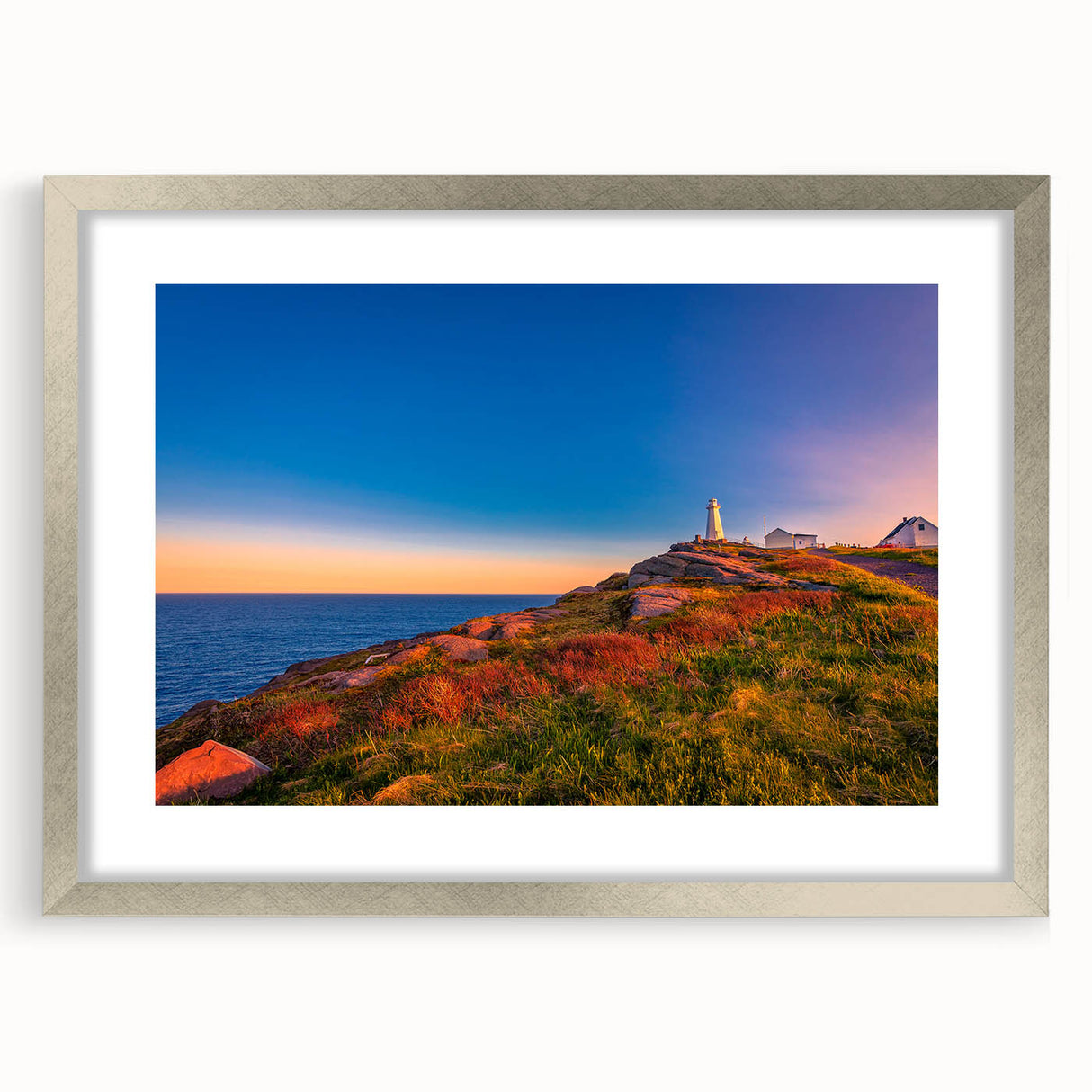 Textured art of an abstract Newfoundland scenery in silver frame with mat, using cool blue and gray tones.
