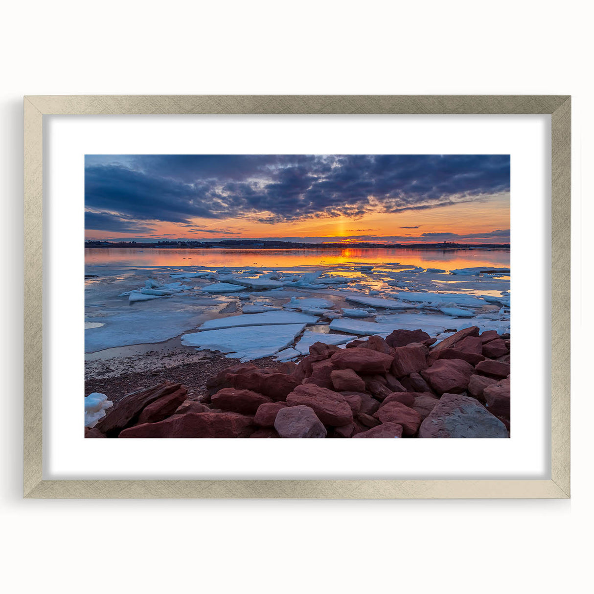 Textured abstract art print depicting a serene Prince Edward Island scenery in muted blue and green tones, framed in silver.