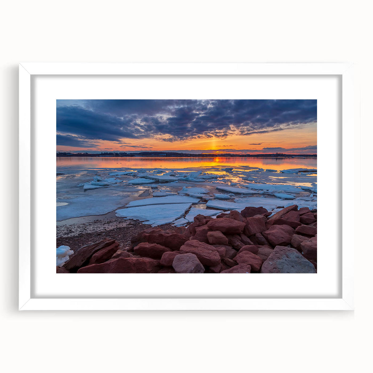 Abstract art print depicting a serene Prince Edward Island landscape in soft blue and green tones, framed with a white mat.