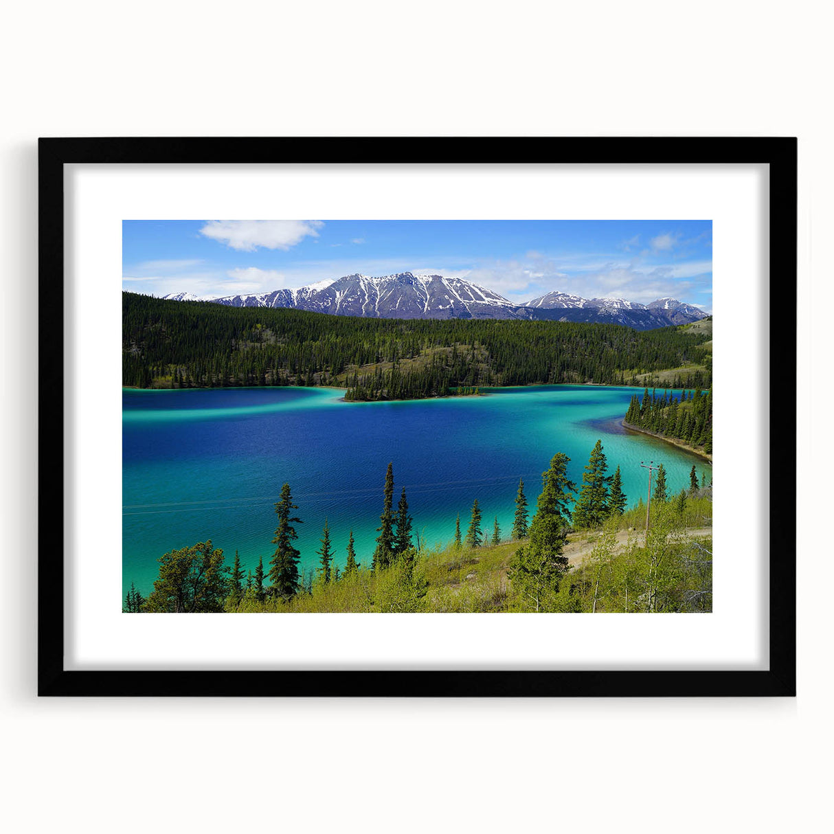 Abstract art print of a vibrant Yukon scenery on a textured, extra large canvas, framed in black.