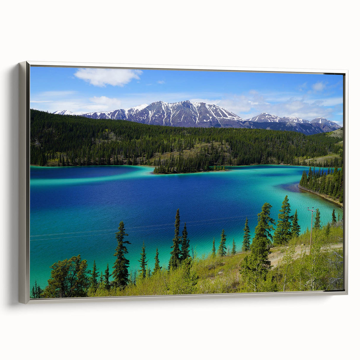 Landscape art painting of Yukon scenery on framed canvas, featuring a vintage poster style with colorful and black elements.