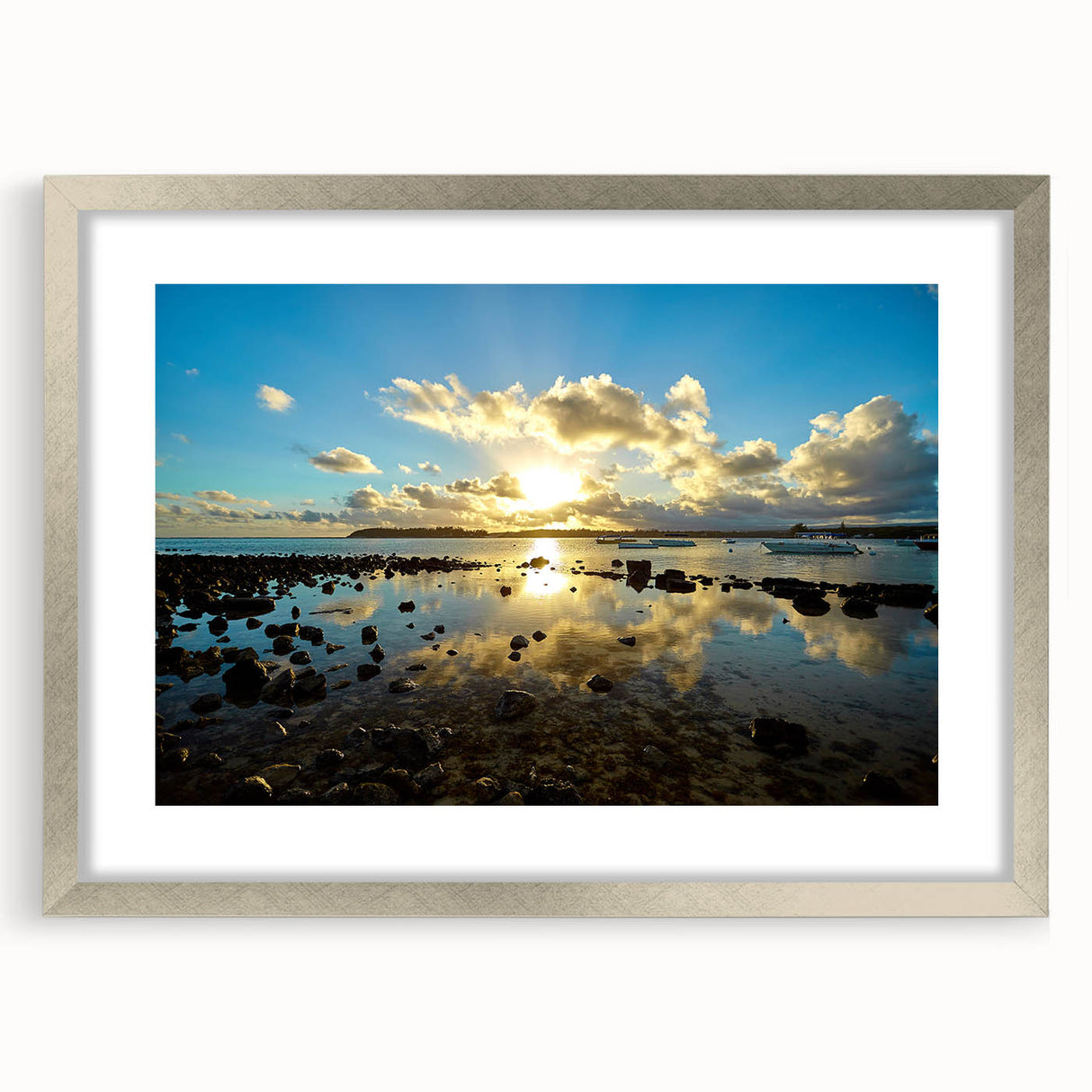 Abstract art print of a Mauritian landscape in muted earth tones on a framed silver mat, ideal for dining room decor.