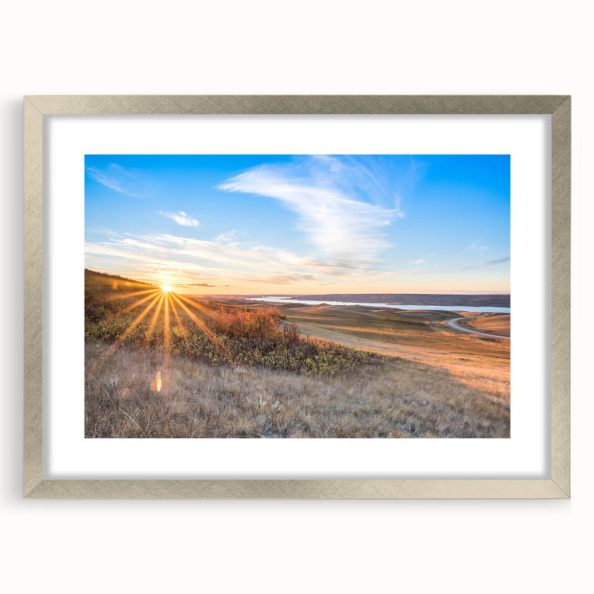 Textured abstract art print depicting a serene Saskatchewan landscape in cool blue and green tones, framed in silver.