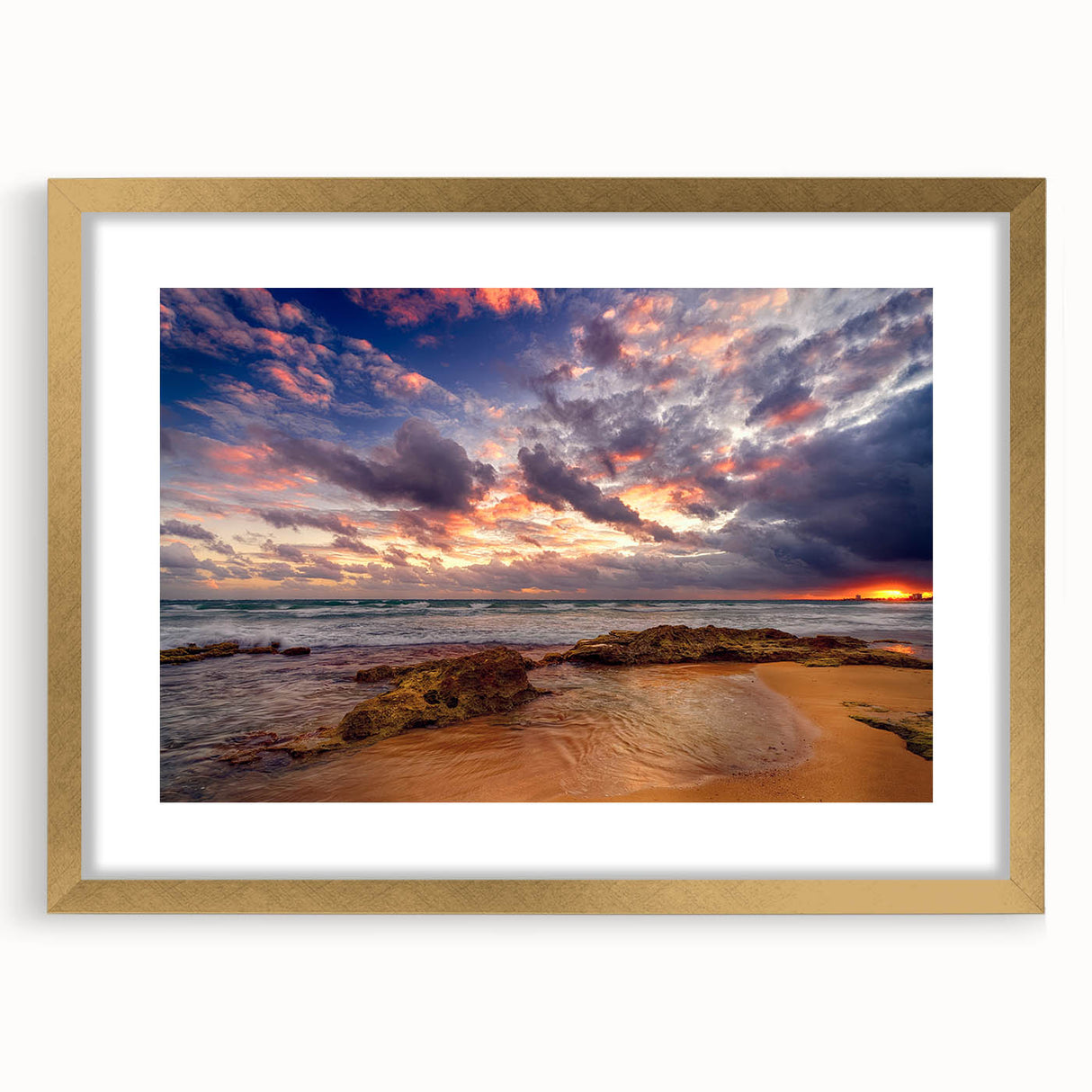 Textured abstract art print of a Caribbean scenery in muted green and blue tones, framed in gold, ideal for bedroom decor.