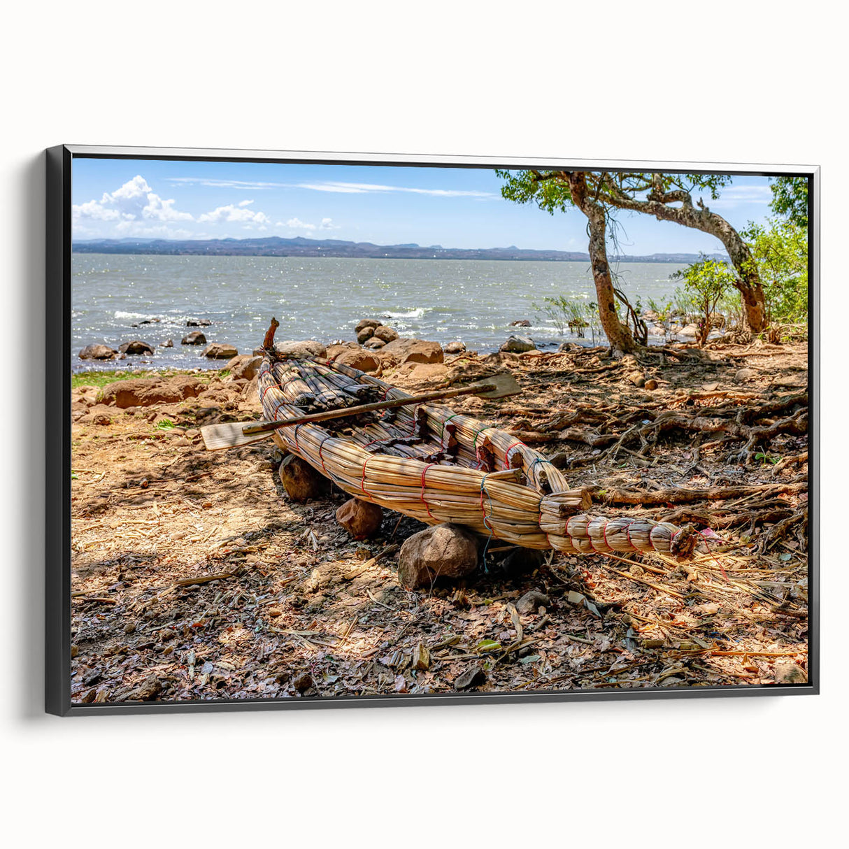 Black and white framed canvas depicting an Ethiopian landscape, ideal for bedroom wall art.