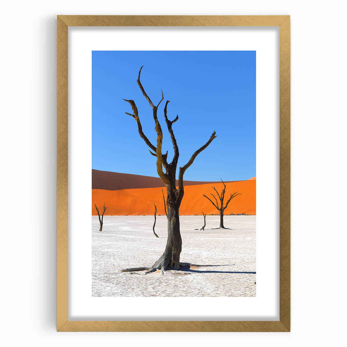 Abstract art print of African scenery in textured gold frame, ideal for extra large wall art in a living room.