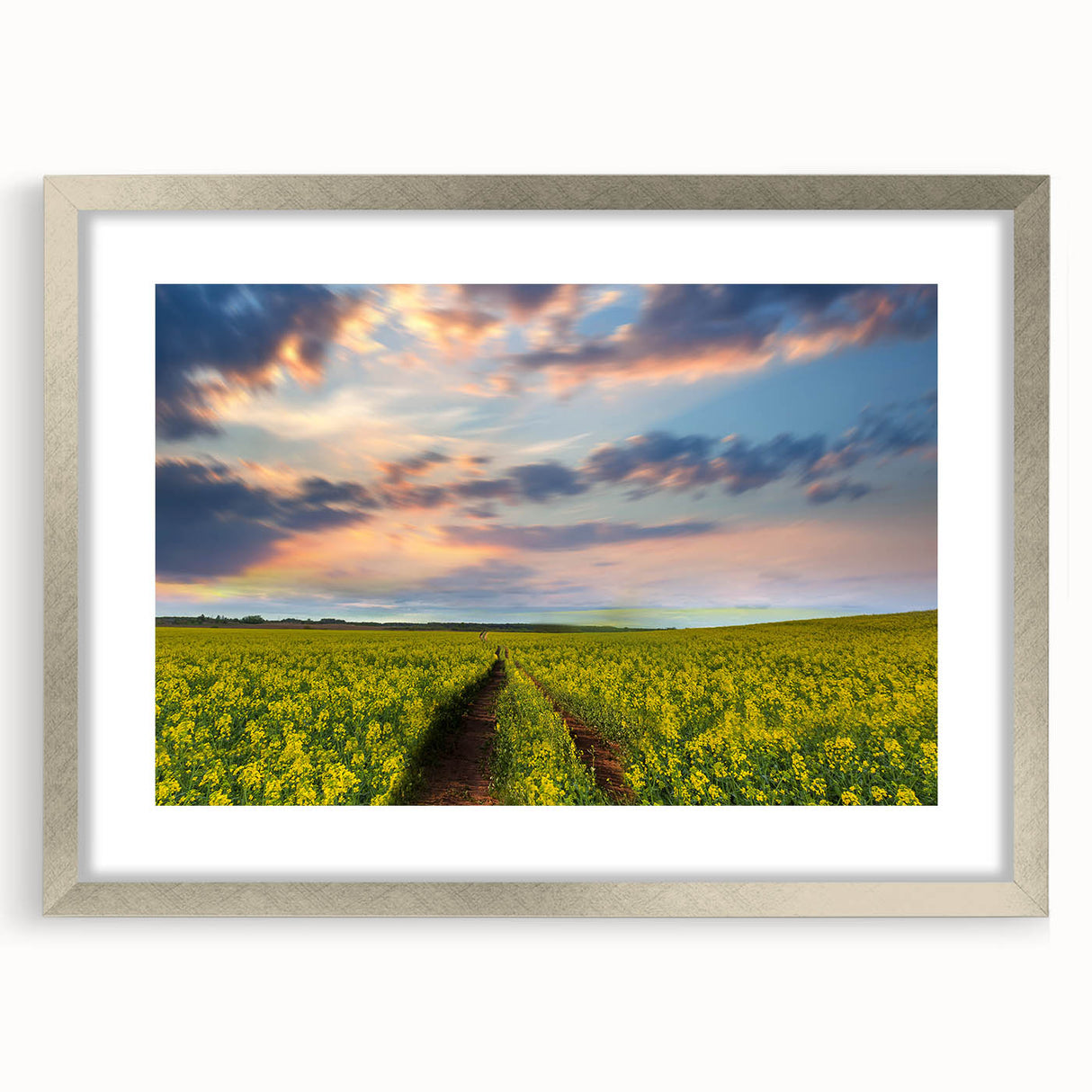 Textured art print of an abstract landscape in muted earth tones, framed in silver, ideal for bedroom decor.