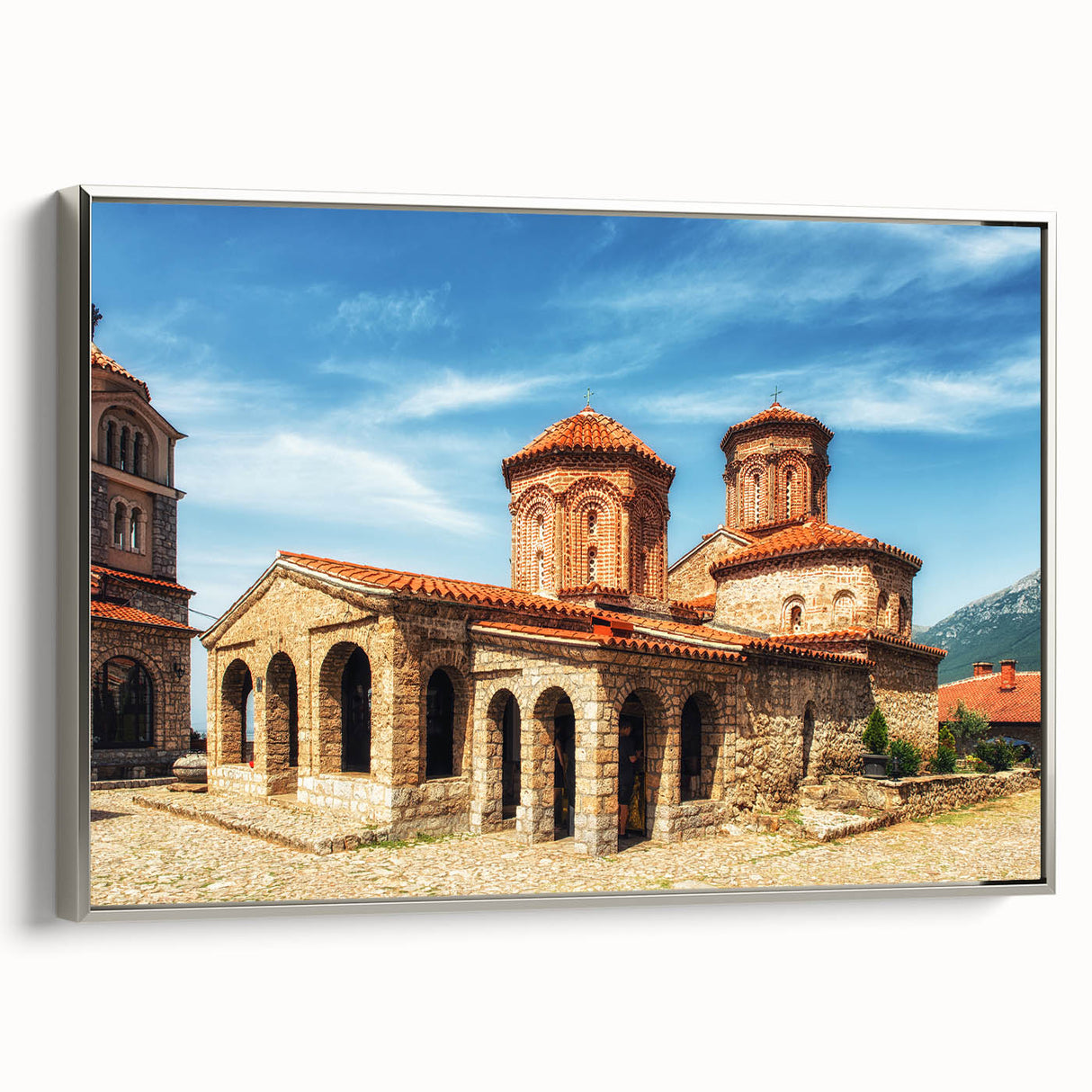 Framed canvas depicting a vintage-style Albanian landscape with colorful art elements, ideal for enhancing living room decor.