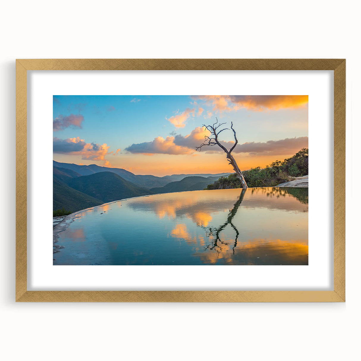 Extra large abstract art print of Oaxaca scenery in textured style, featuring earth tone colors, framed in gold.