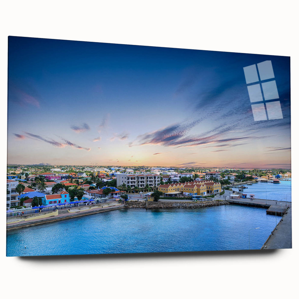 Large abstract wall art of Caribbean scenery in vibrant blue and green hues on acrylic glass.