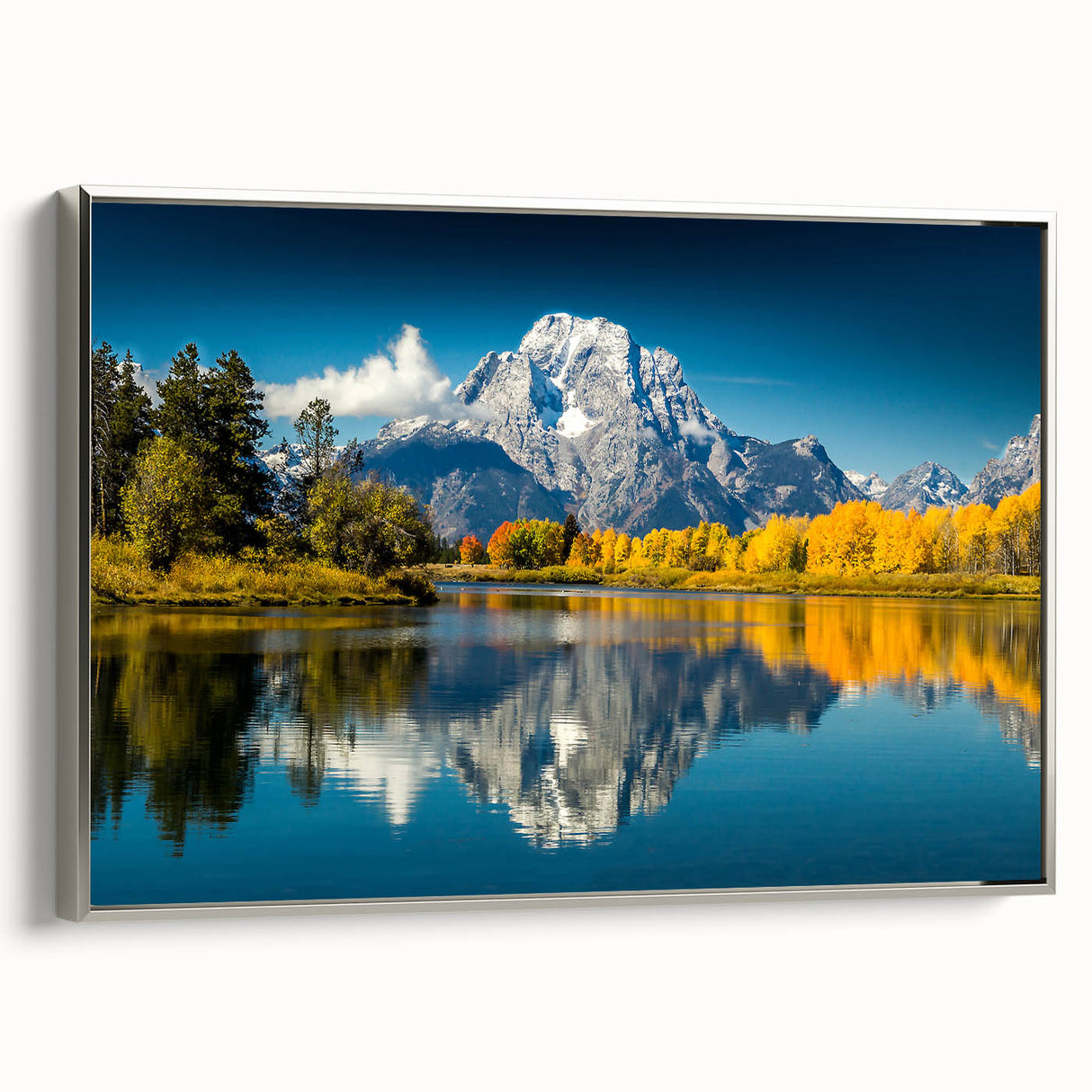Framed canvas of Grand Tetons landscape with muted earth tones, ideal for office or study decor.