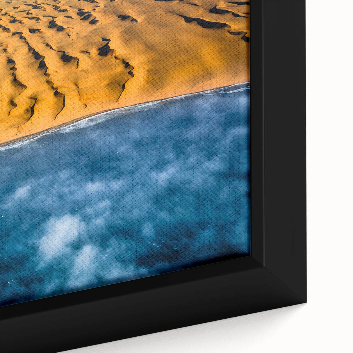 Extra large framed canvas featuring a textured depiction of a Namibian landscape in black with colorful accents.