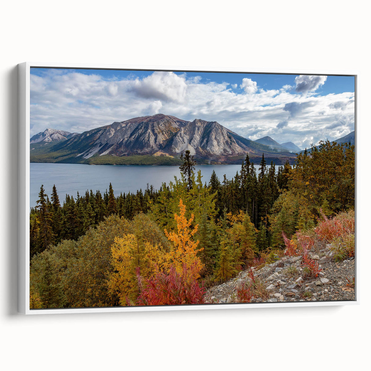 Framed canvas featuring a vintage poster of Yukon scenery with vibrant colors, ideal for living room decor.
