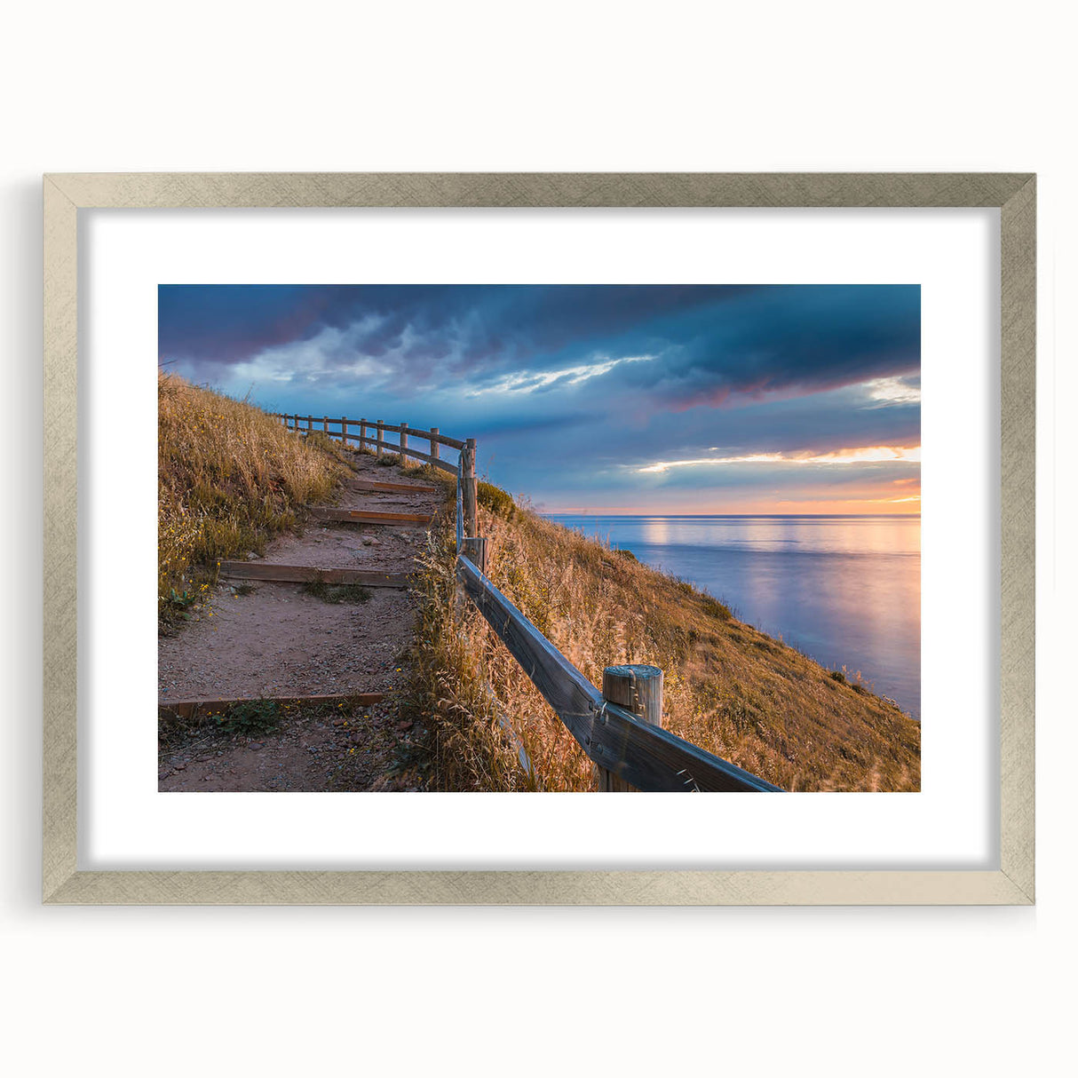 Abstract art print of Adelaide scenery in muted earth tones, framed in silver, ideal for dining room decor.