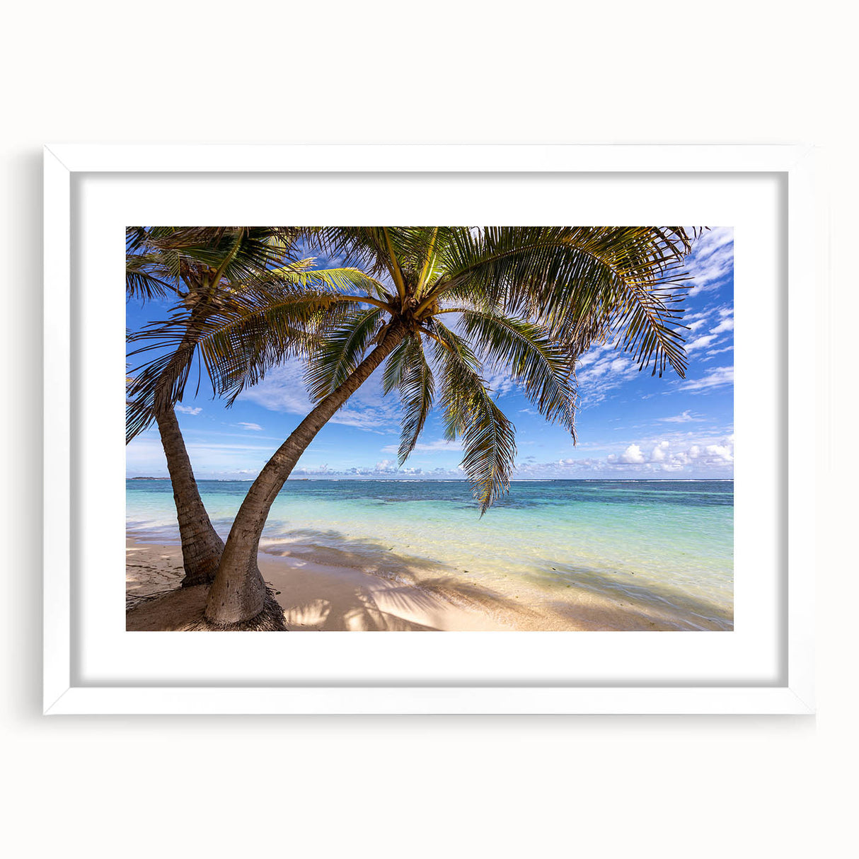 Textured abstract art print depicting Martinique scenery in vibrant blue and green hues, framed with a white mat.