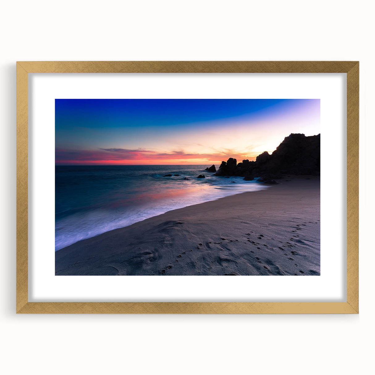 Extra large wall art featuring abstract depiction of Cabo San Lucas in textured gold and blue tones, framed with mat.