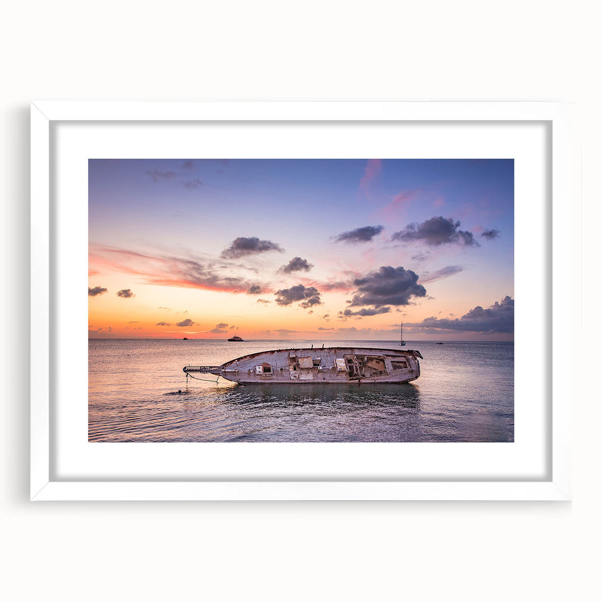 Abstract art print of Oaxaca scenery in muted earth tones, framed with a white mat.