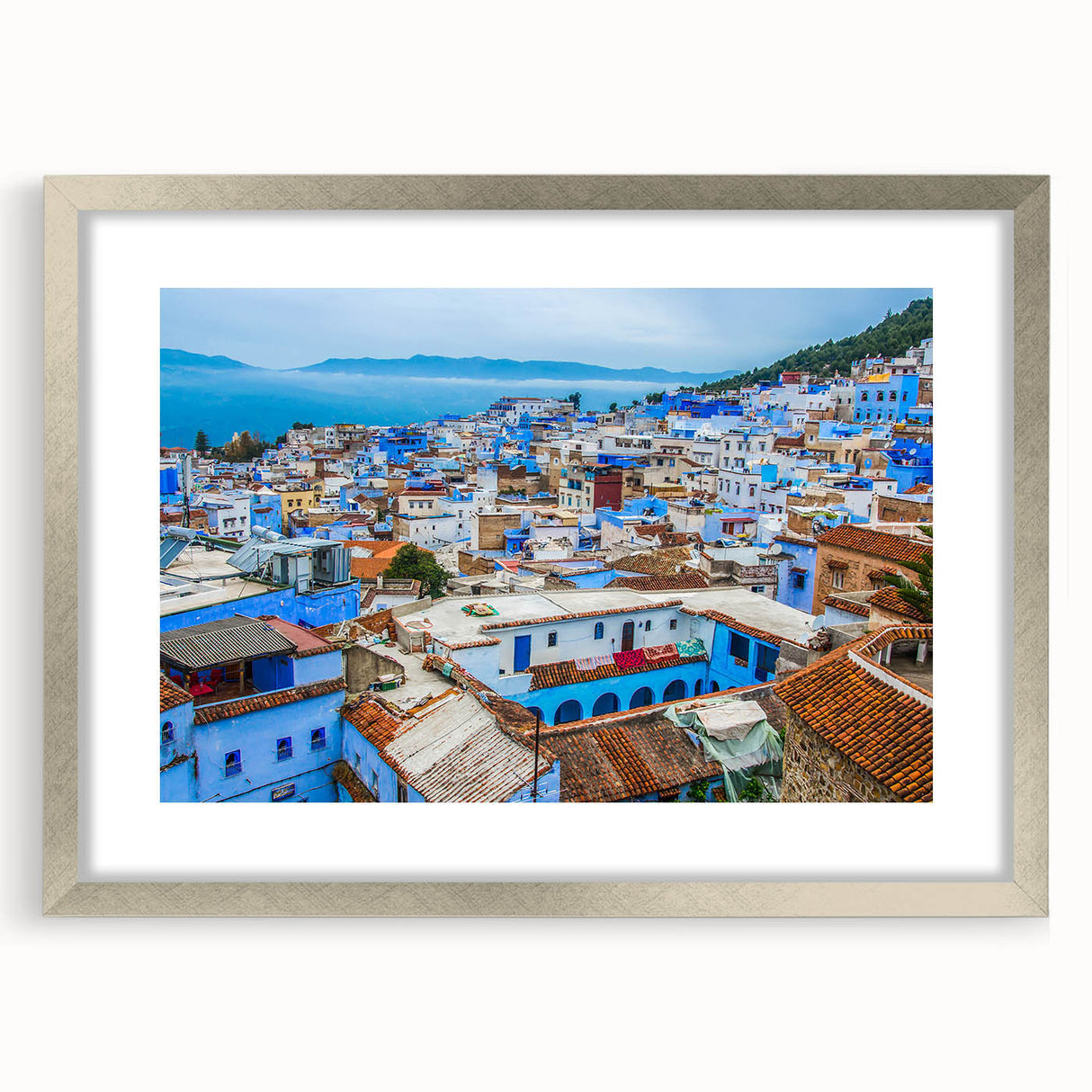 Abstract art print of a Moroccan landscape in muted earth tones, framed with a silver mat, ideal for dining room decor.