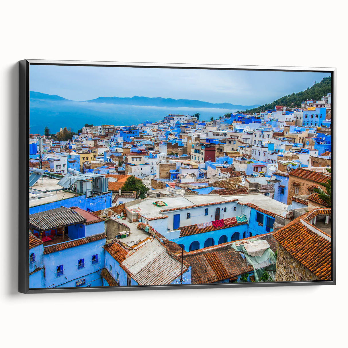 Black and white framed canvas of a Moroccan landscape, ideal for bedroom wall decor.