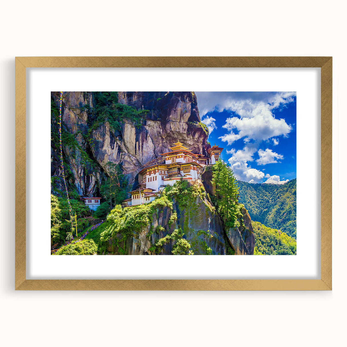 Extra large abstract art print depicting a textured Asian scenery, in muted gold and earth tones, framed with a gold mat.