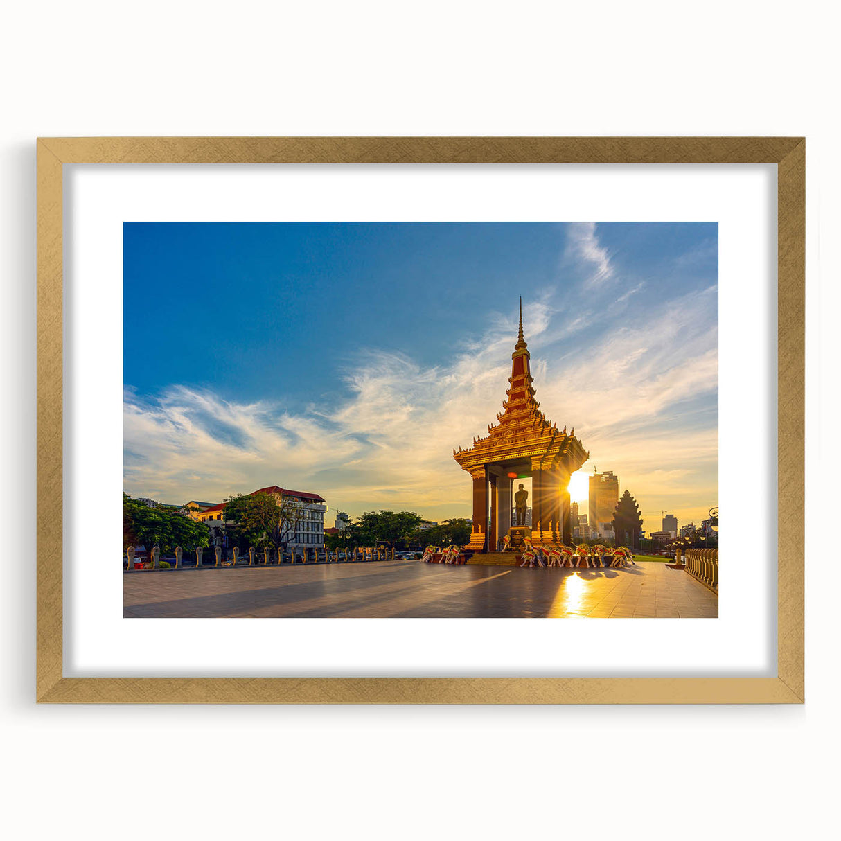 Extra large abstract art print of a Cambodian landscape, featuring textured earth tones, in a gold frame.