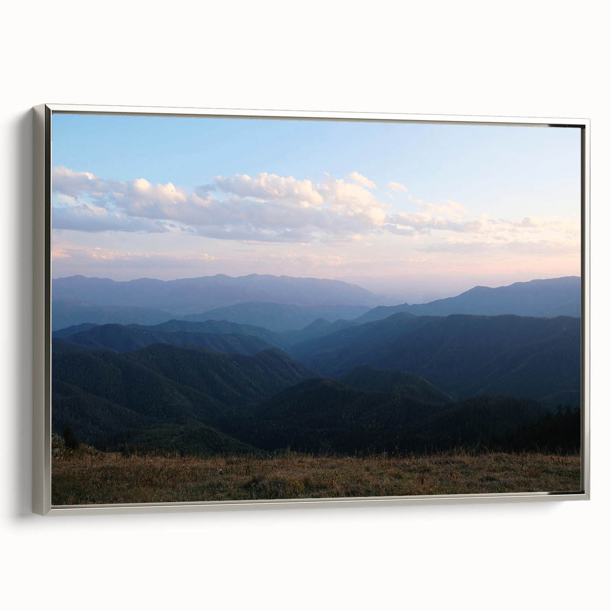 Framed canvas featuring a vintage-style landscape painting of the Georgian countryside in muted earth tones.