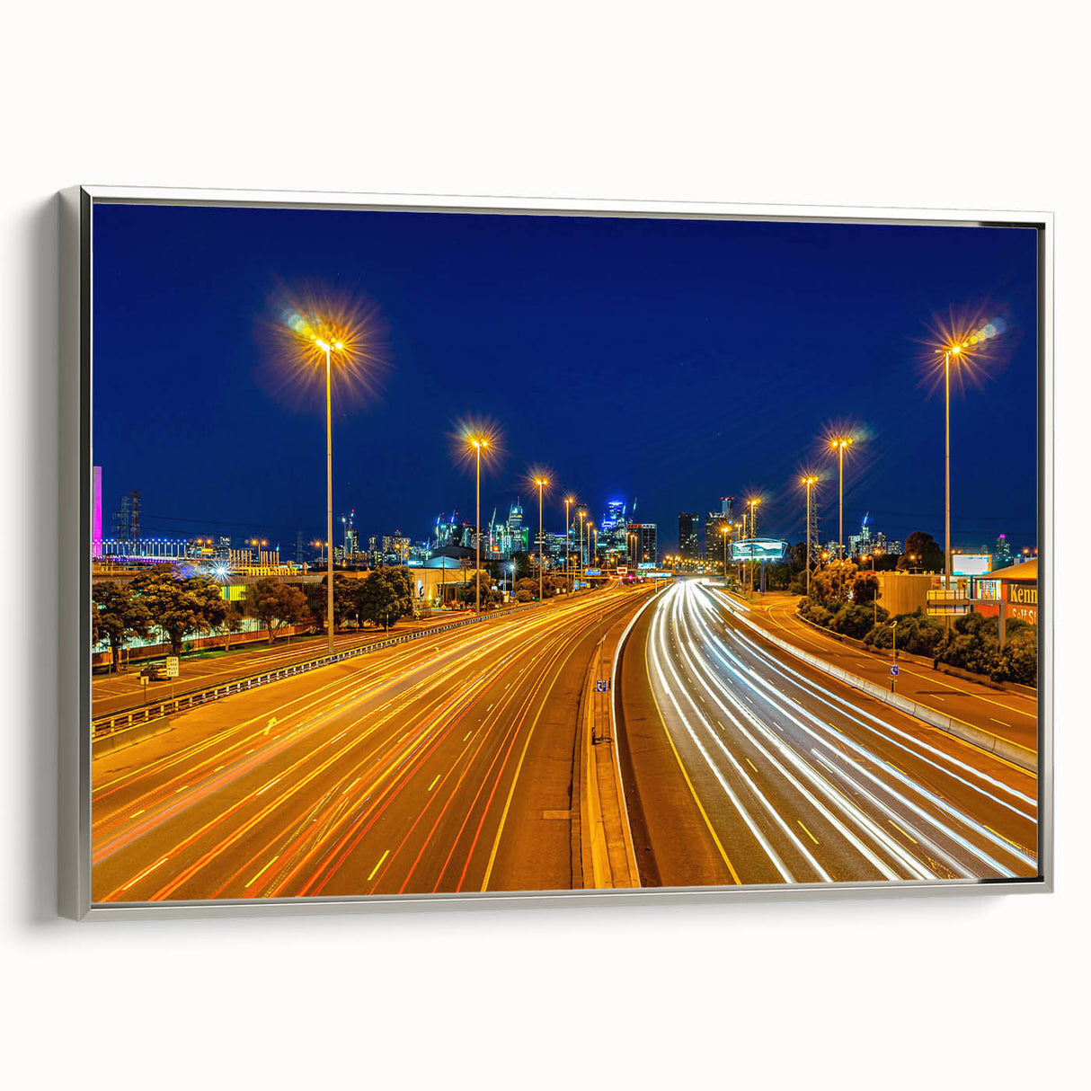 Vintage poster art of Melbourne scenery on extra large framed canvas, featuring colorful art against a black background.