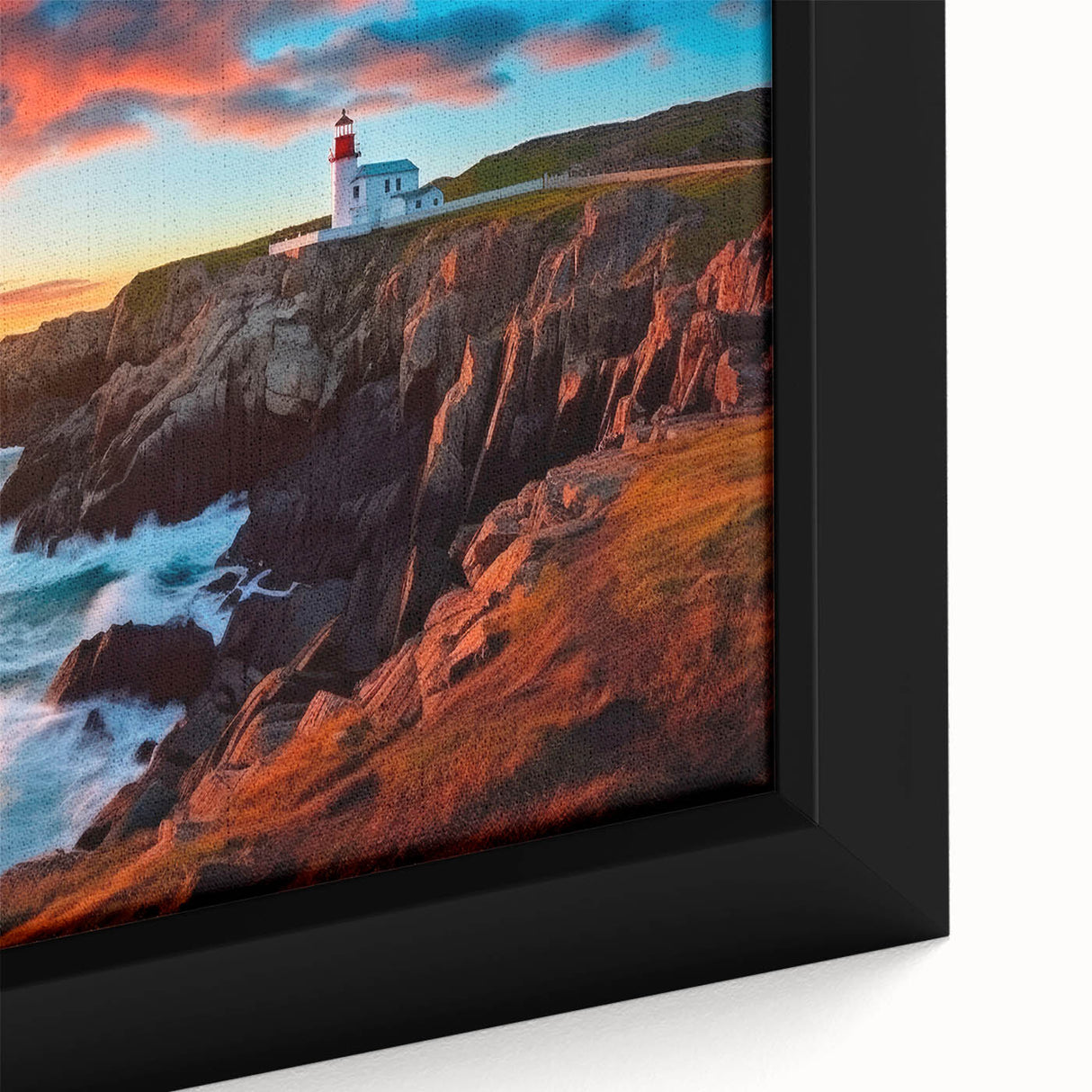 Close-up of a textured black wall art depicting a colorful Newfoundland scenery on a framed canvas.