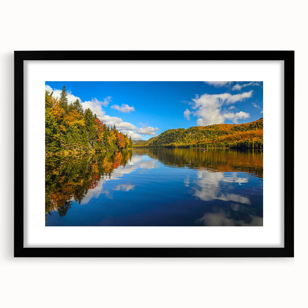 Extra large wall art featuring a colorful, abstract depiction of Quebec scenery, presented in a black frame with mat.