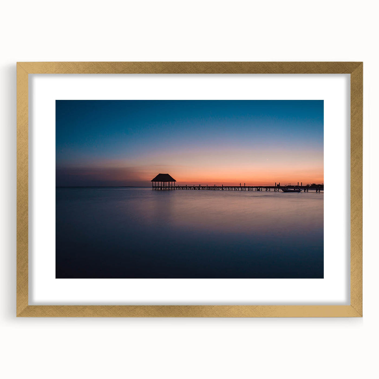 Extra large abstract art print depicting a textured scenery of Oaxaca, in muted earth tones, framed in gold.