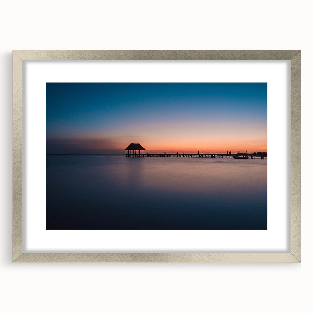 Textured abstract art print featuring a scenery of Oaxaca, in muted earth tones, framed in silver, ideal for bedroom art.