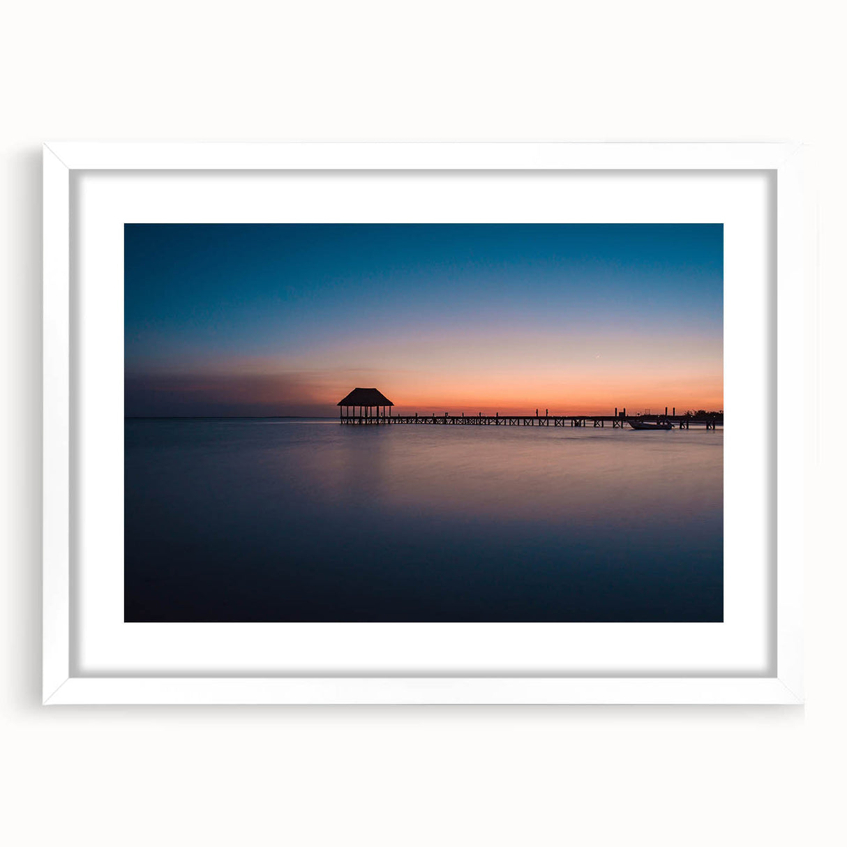 Abstract art print of Oaxaca scenery in muted earth tones on a framed white mat, suitable for dining room decor.