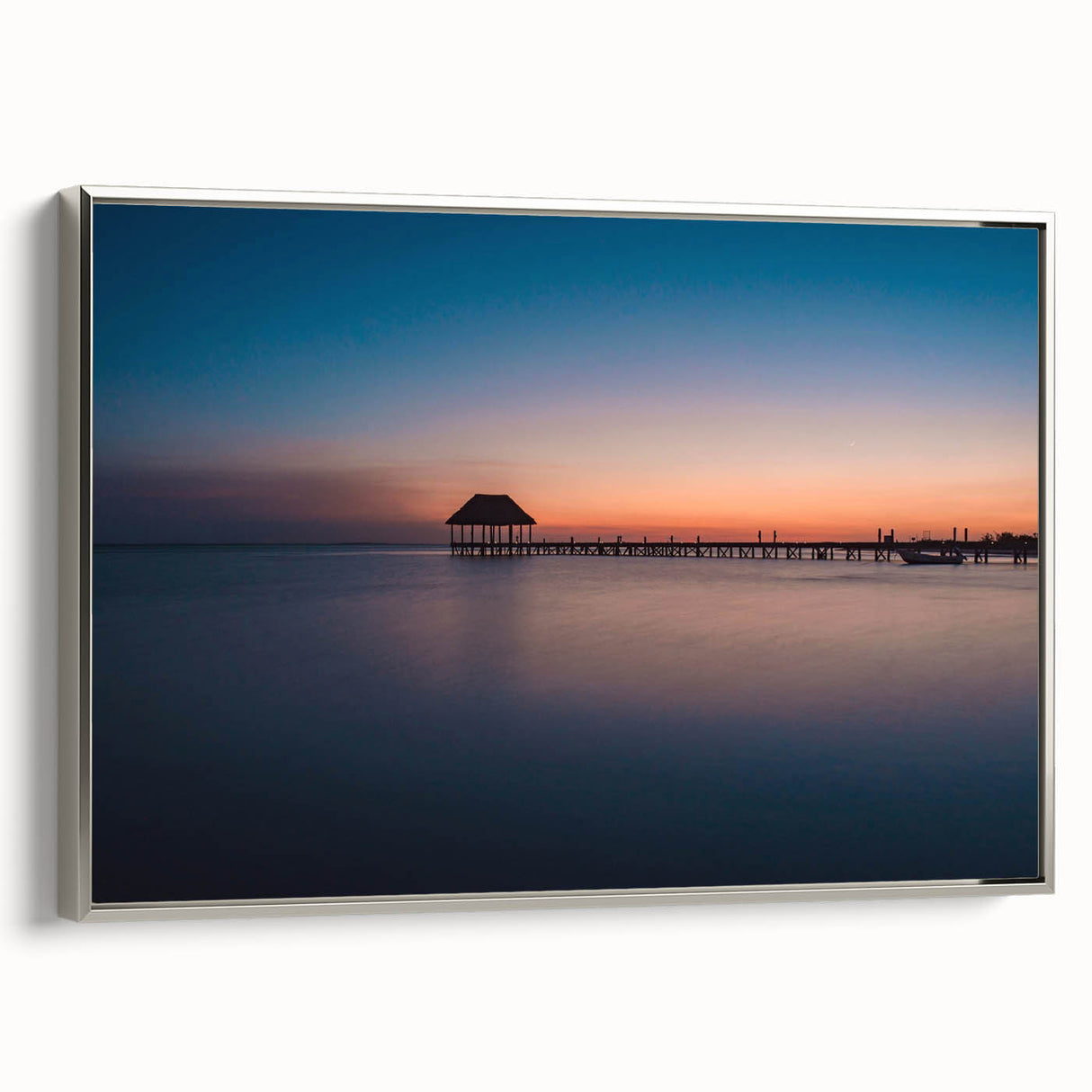 Framed canvas of a vintage-style landscape painting depicting Oaxaca scenery, featuring colorful art on a black background.