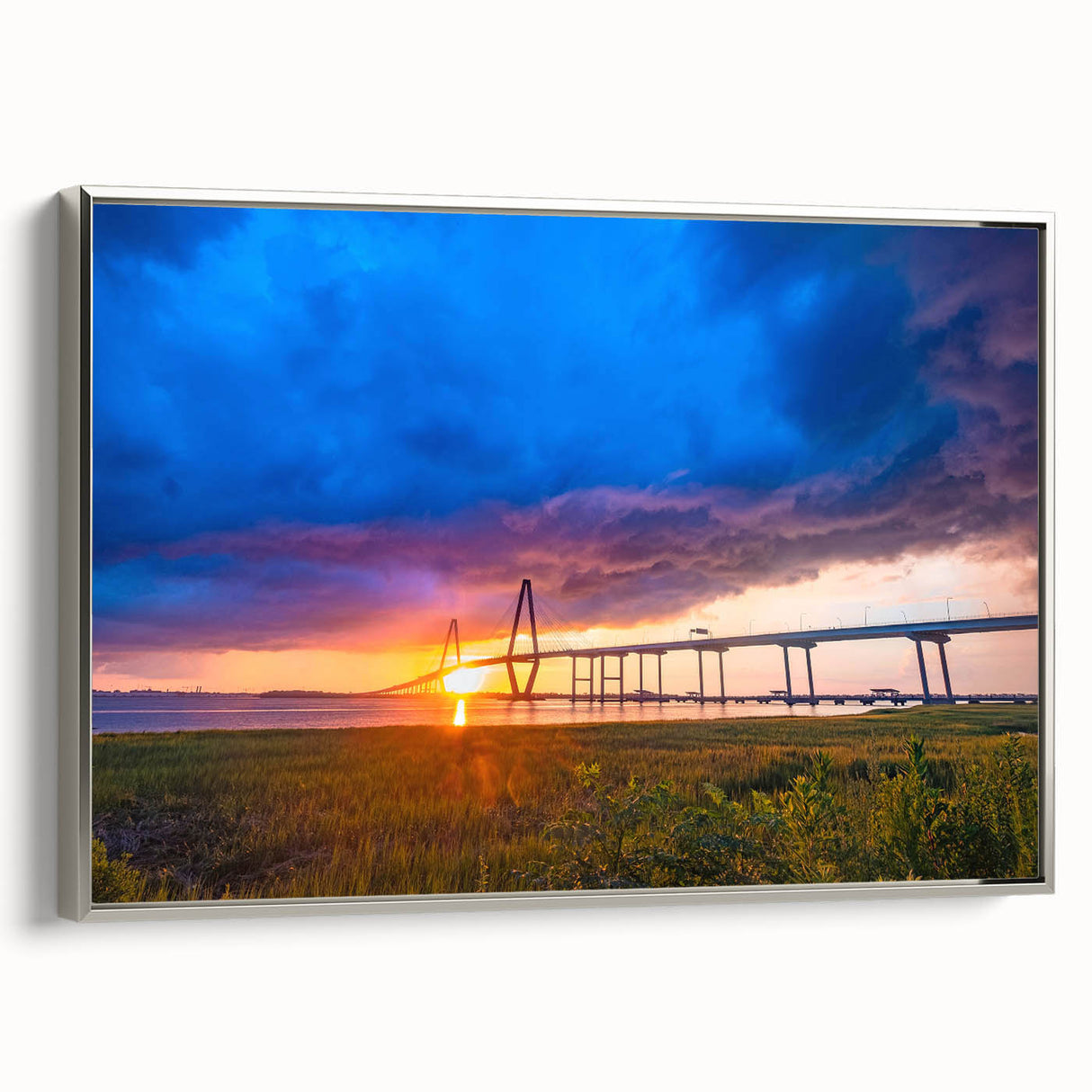 Framed canvas of a Charleston landscape featuring vintage poster art style in colorful and black tones.