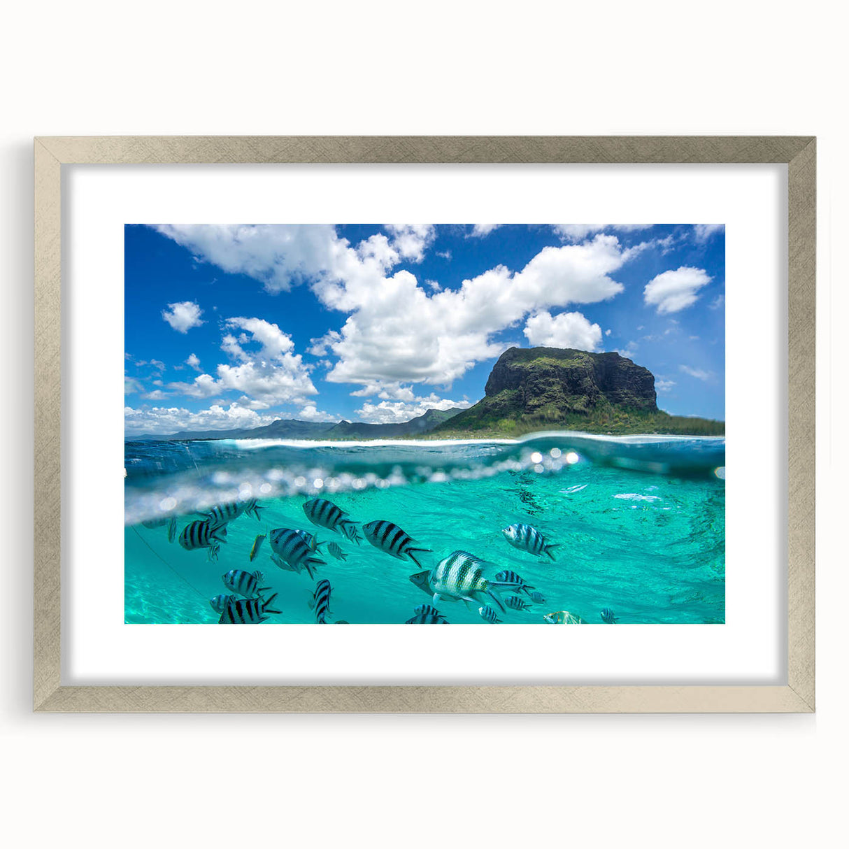 Abstract art print of a Mauritian landscape in cool blue and green tones on a framed silver canvas.