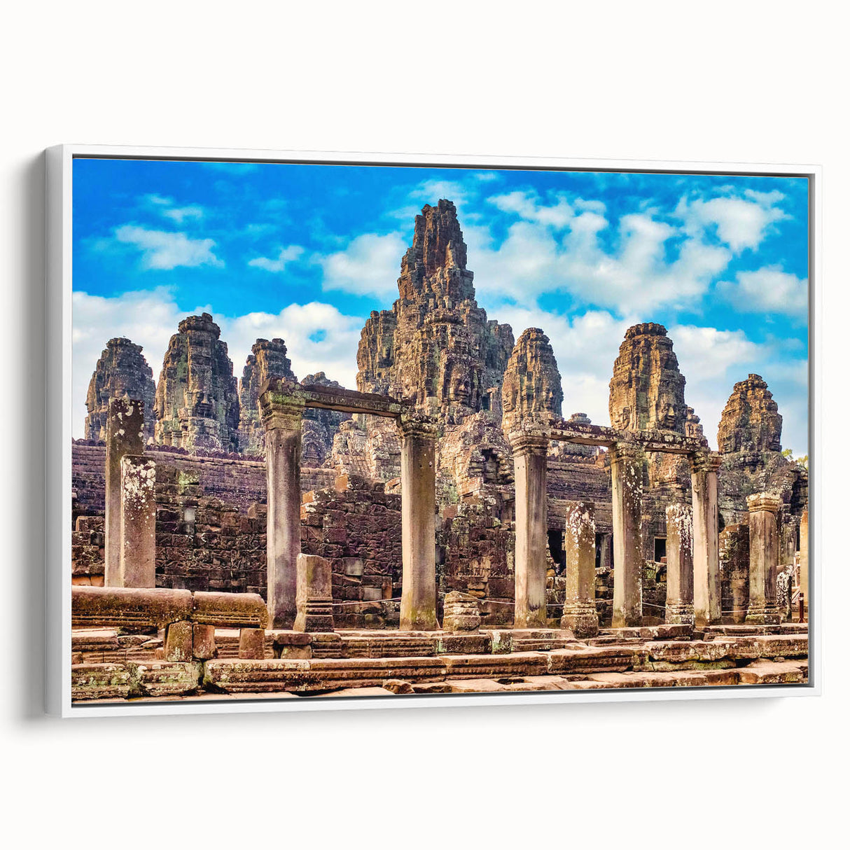 Vintage poster art of a Cambodian landscape on a large framed canvas, featuring vibrant colors against a black background.