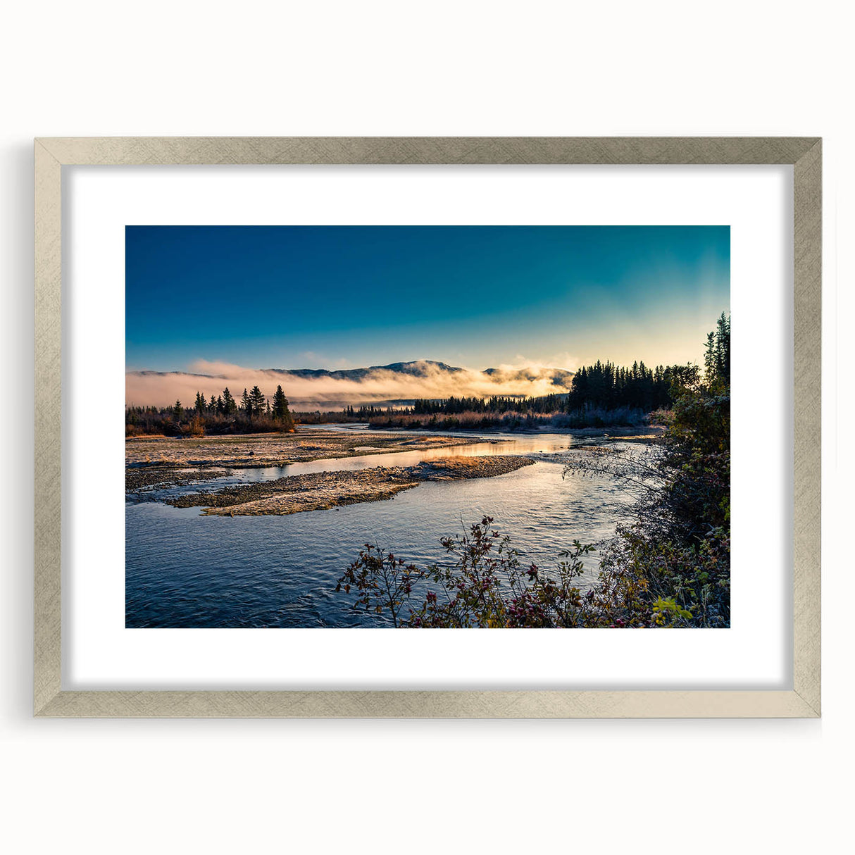 Textured abstract art print depicting the Yukon scenery in muted earth tones, framed in silver, ideal for bedroom wall decor.