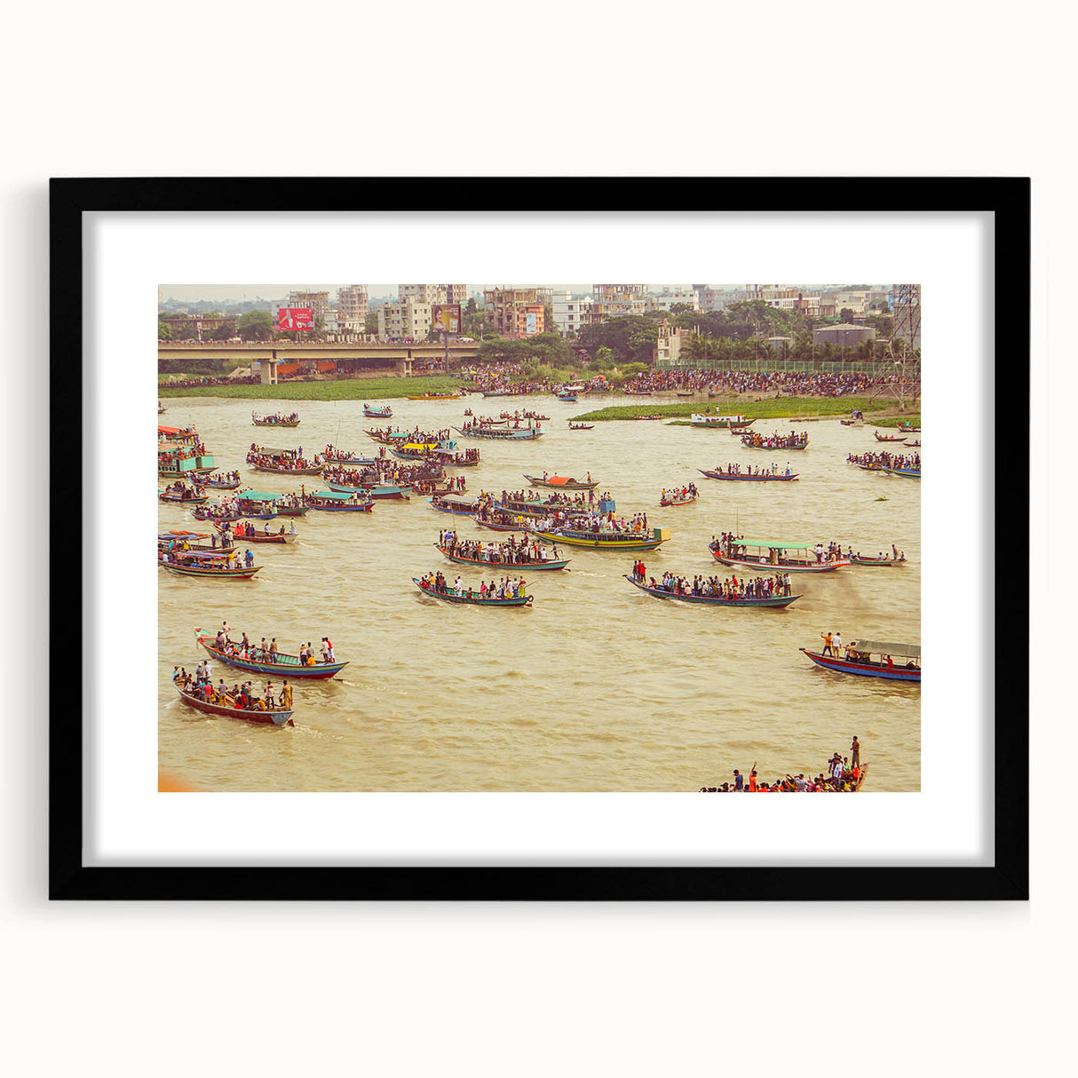 Colorful abstract art print of a textured scenery, in a large black frame, ideal for living room decor.