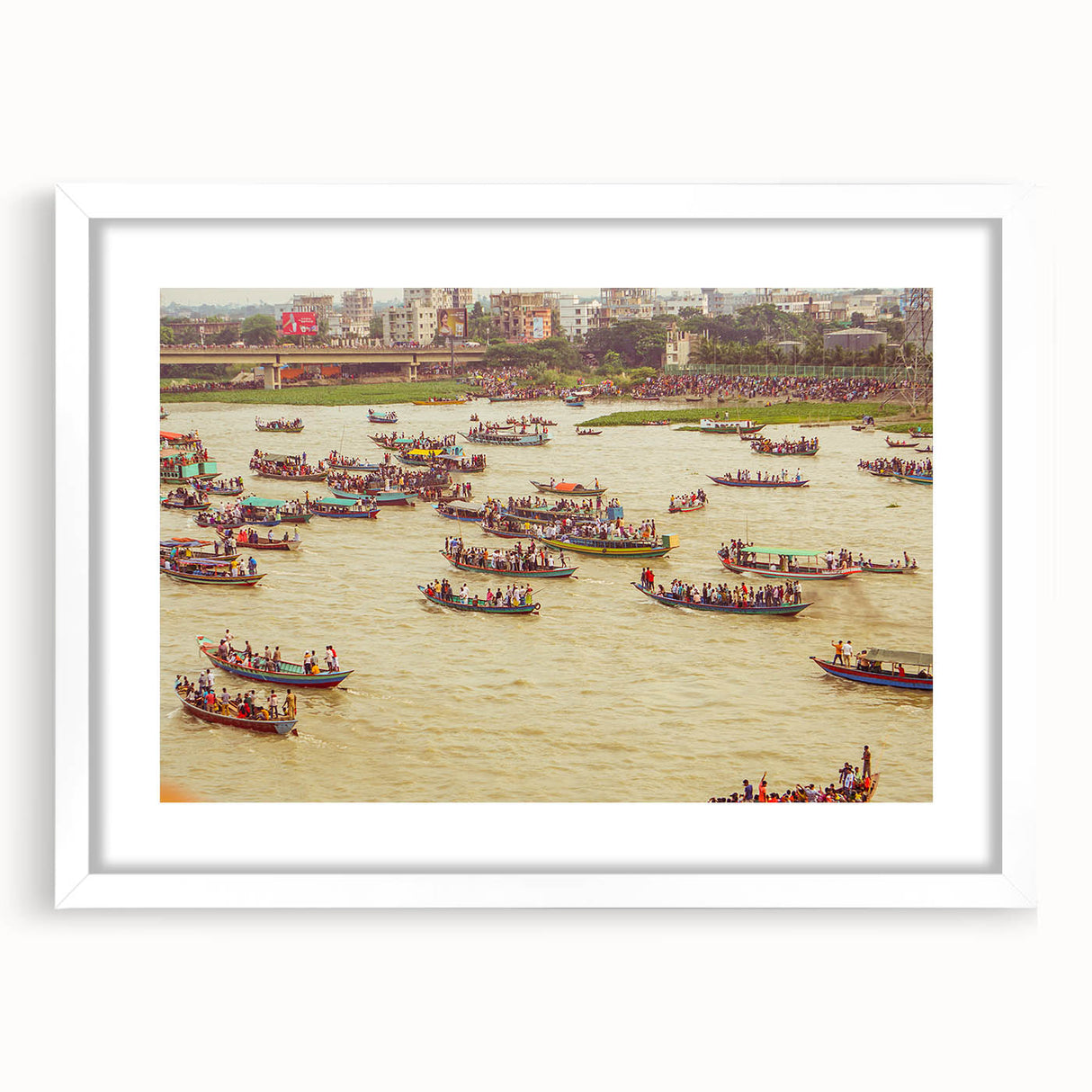 Abstract art print of a Bangladesh scenery in muted green and blue tones, framed with a white mat.
