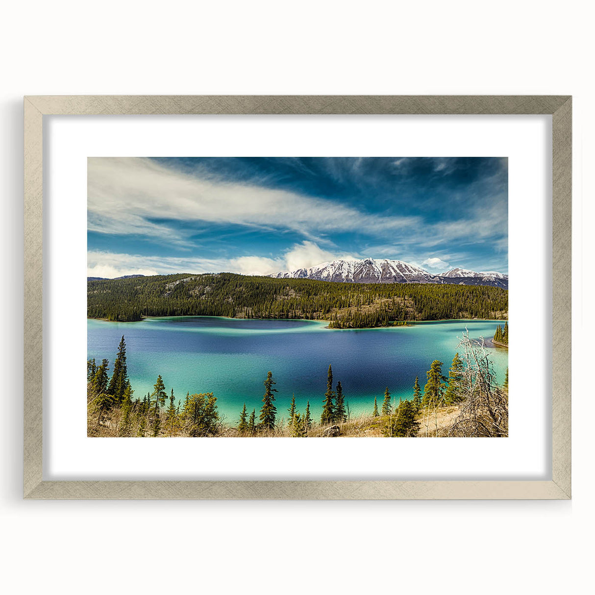 Textured abstract art print of Yukon scenery in muted earth tones, framed in silver, ideal for bedroom art.